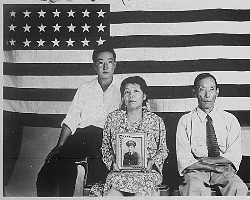 The Hirano family, left to right, George, Hisa, and Yasbei. Colorado River Relocation Center, Poston, Arizona., 1942 - 1945